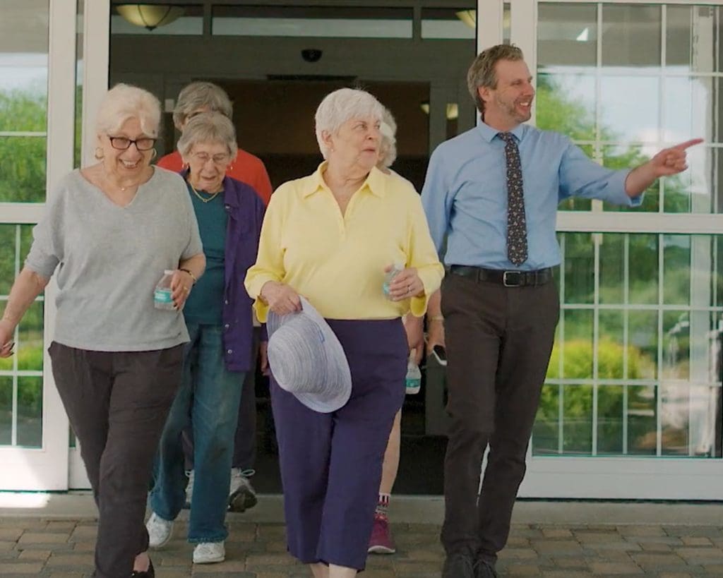 Michael Langlois with Essex Meadows residents