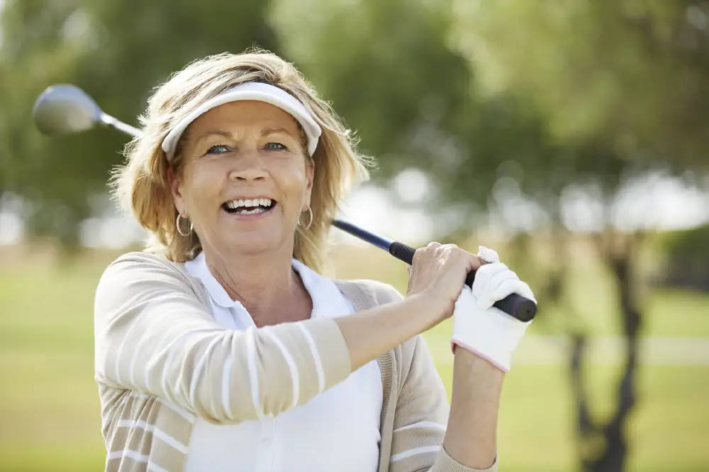 An Essex Meadows resident out golfing and carrying her driver